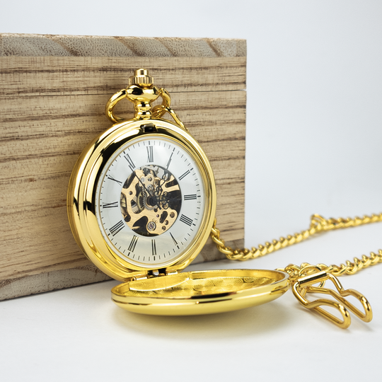 Mechanische Taschenuhr mit Gravur in Gold mit römischem Zifferblatt